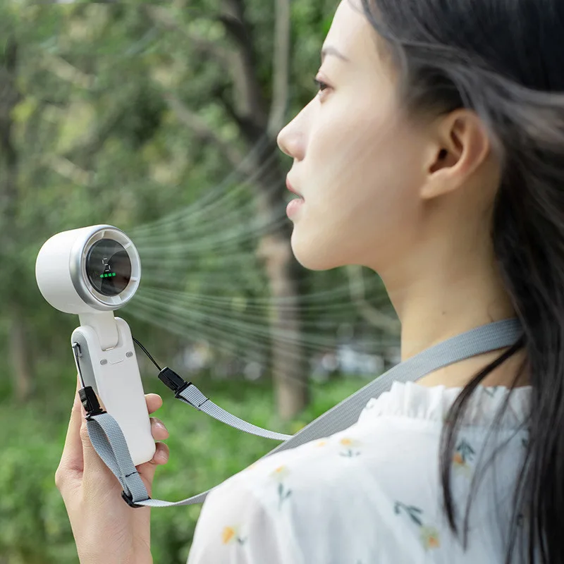 Ventilateur turbo pliant tenu à la main, porté au cordon, en extérieur
